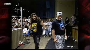 The set is light on matches, but does include a few bright spots including this barbed wire match with the Sandman.